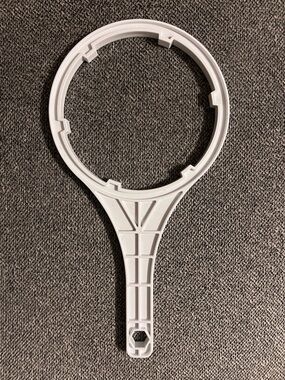 White Plastic Filter Wrench Tool - Fits Whirlpool 10” filter housing.